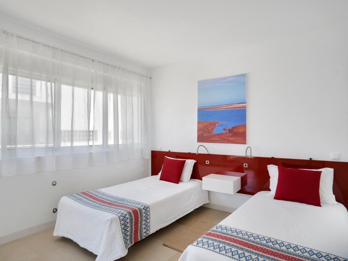 Uma cama ou camas num quarto em Golden Club Cabanas