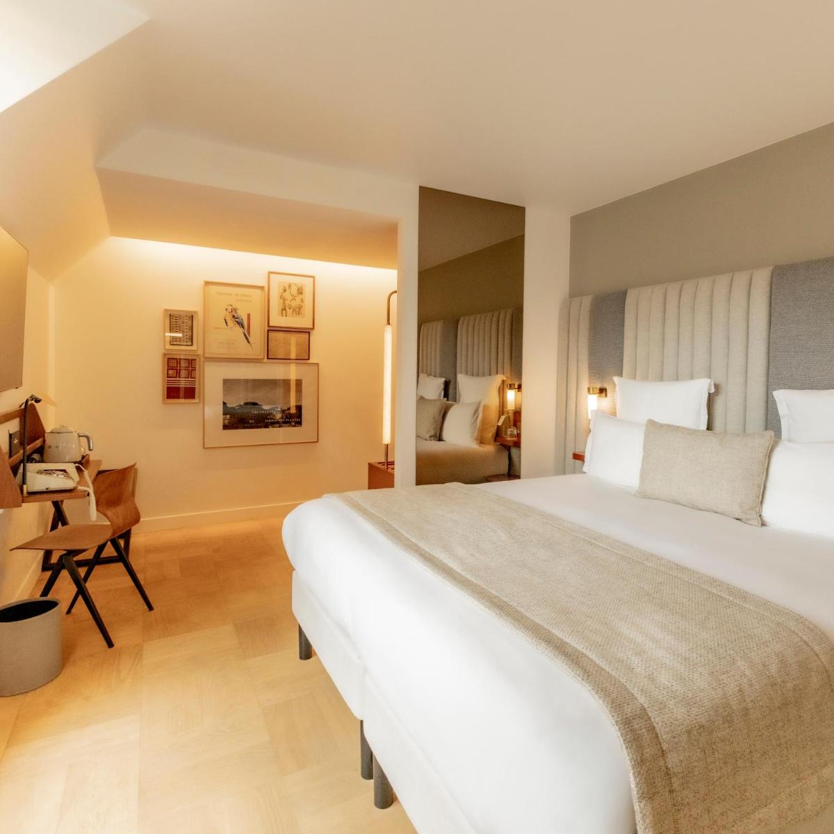 Un ou plusieurs lits dans un hébergement de l'établissement Hôtel Pilgrim