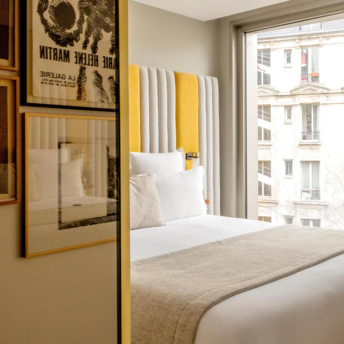 Un ou plusieurs lits dans un hébergement de l'établissement Hôtel Pilgrim