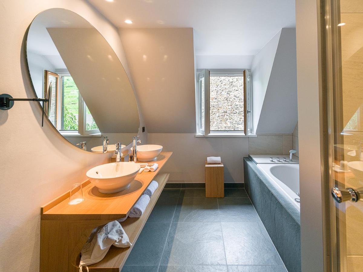 Salle de bains dans l'établissement Relais et Châteaux Le Chambard