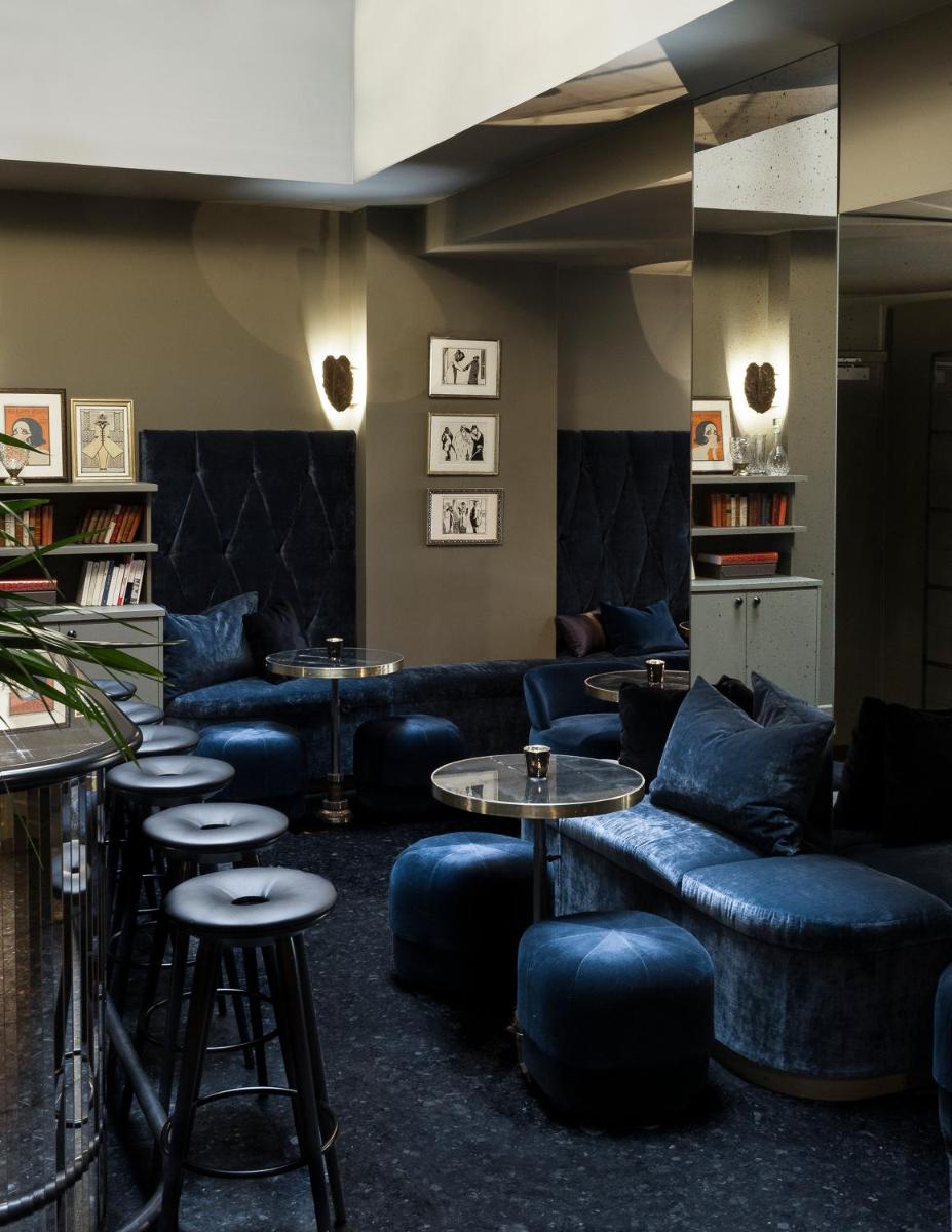 Coin salon dans l'établissement Monsieur Cadet Hotel & Spa