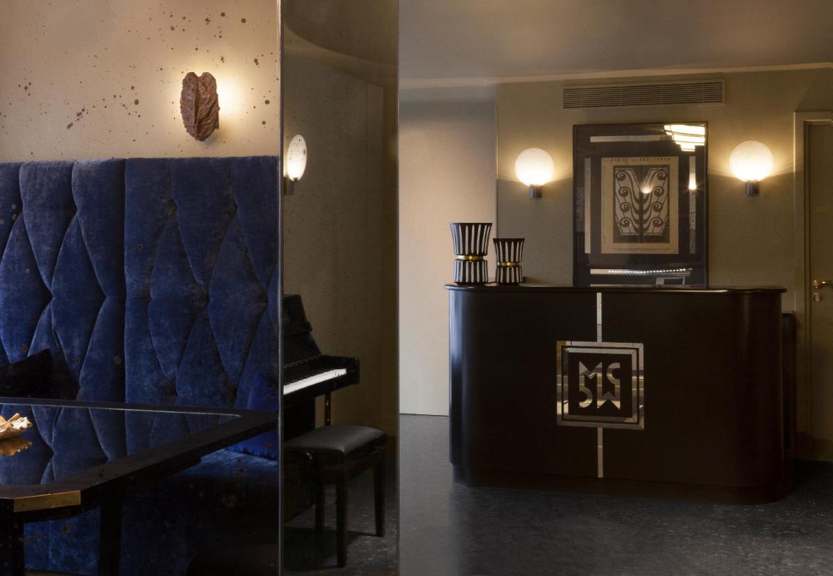 Coin salon dans l'établissement Monsieur Cadet Hotel & Spa