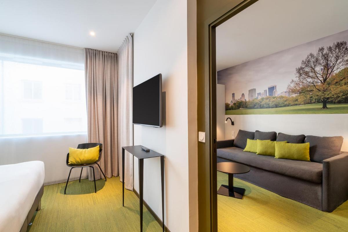 Télévision ou salle de divertissement dans l'établissement BW Plus Central Park Hotel & Spa