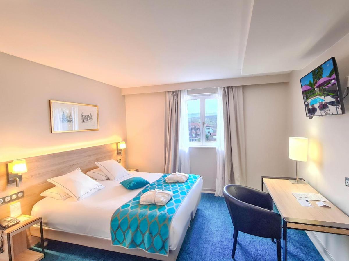 Un ou plusieurs lits dans un hébergement de l'établissement Best Western Plus Hotel & SPA Le Schoenenbourg
