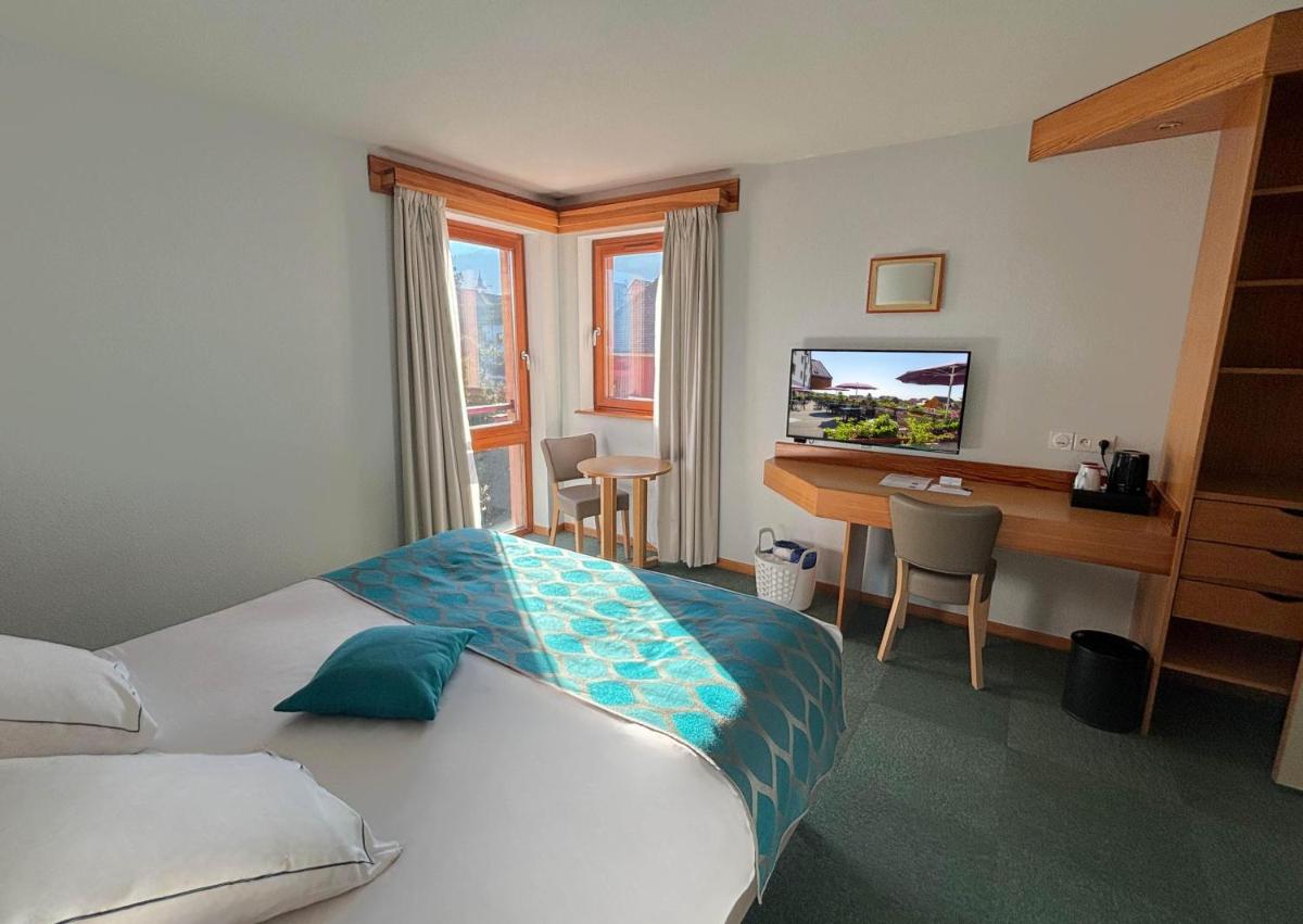 Un ou plusieurs lits dans un hébergement de l'établissement Best Western Plus Hotel & SPA Le Schoenenbourg