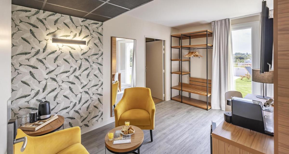 Coin salon dans l'établissement Best Western Côte des Sables Plouescat