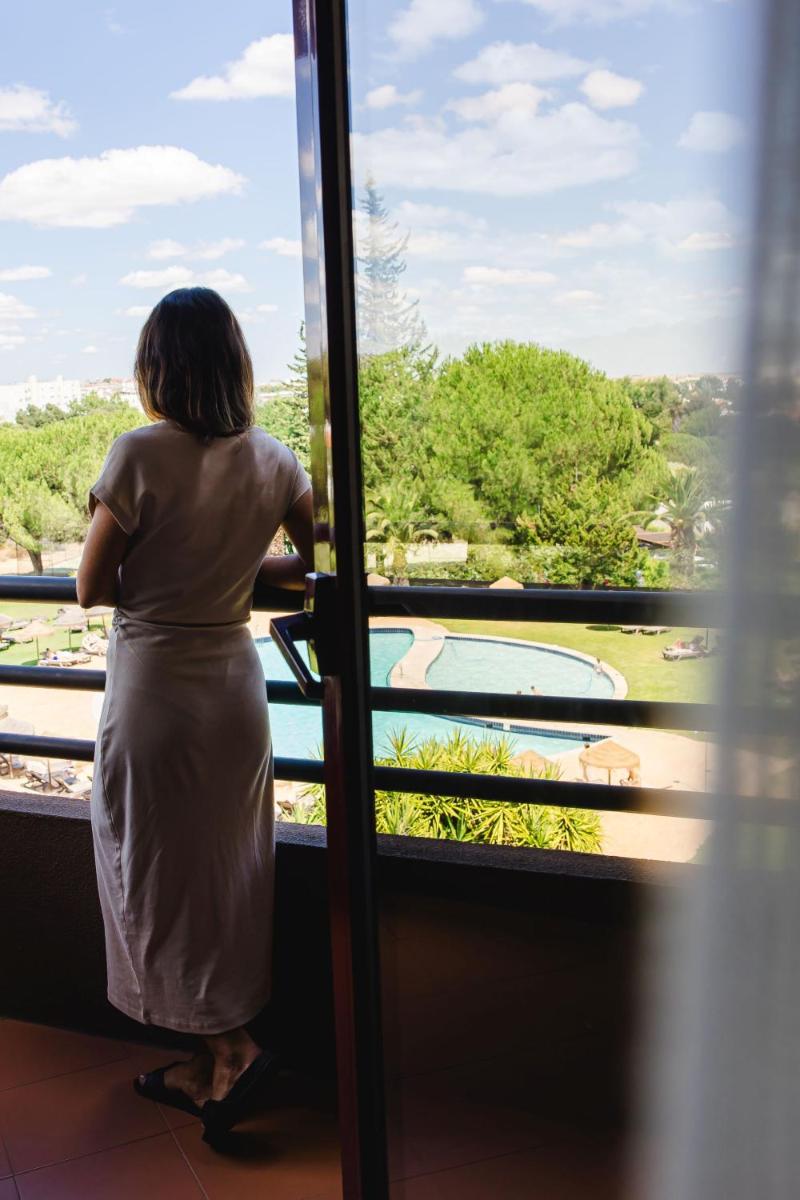 Uma varanda ou terraço em Evora Hotel