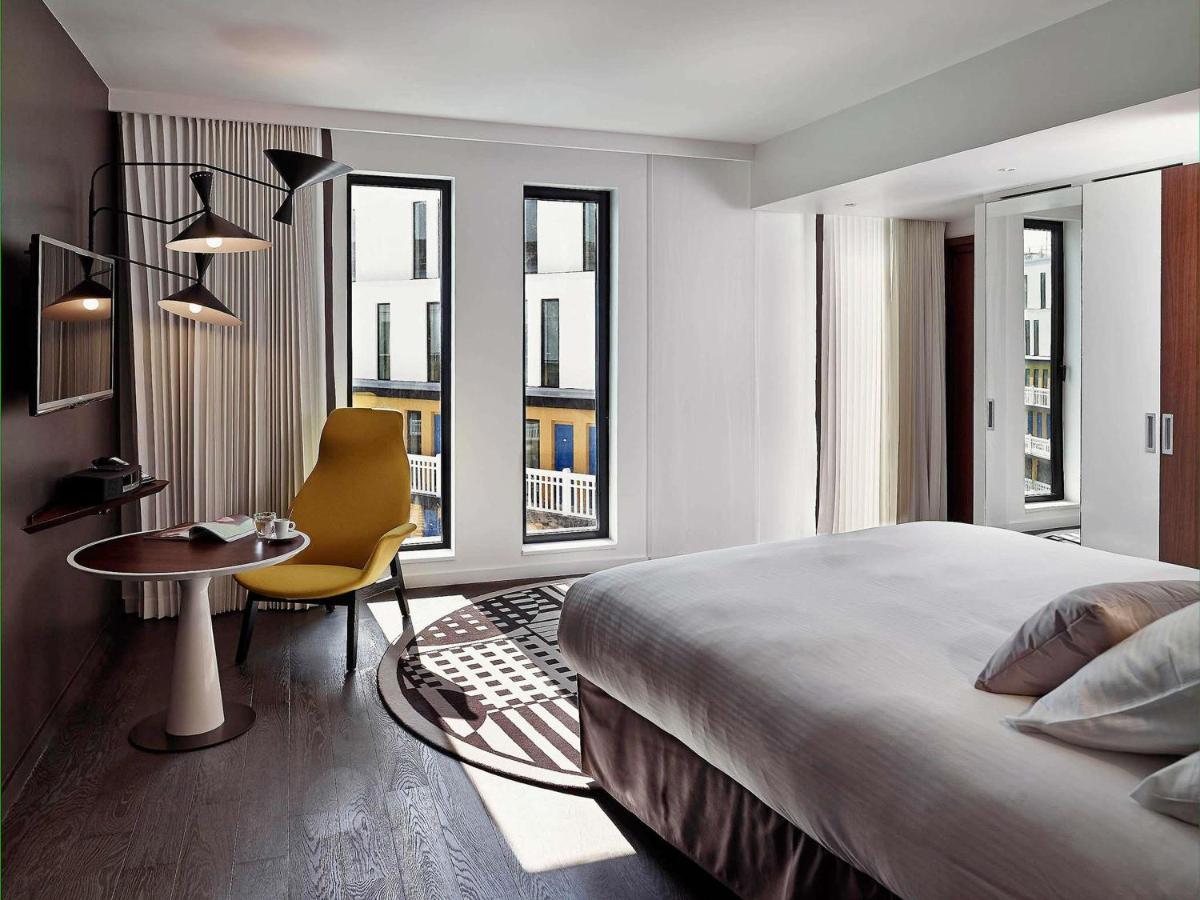 Un ou plusieurs lits dans un hébergement de l'établissement Molitor Hotel & Spa Paris - MGallery Collection