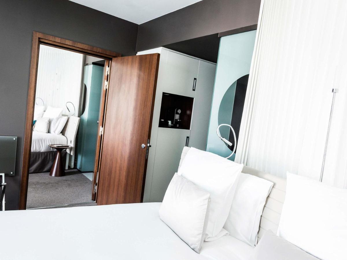 Un ou plusieurs lits dans un hébergement de l'établissement Molitor Hotel & Spa Paris - MGallery Collection