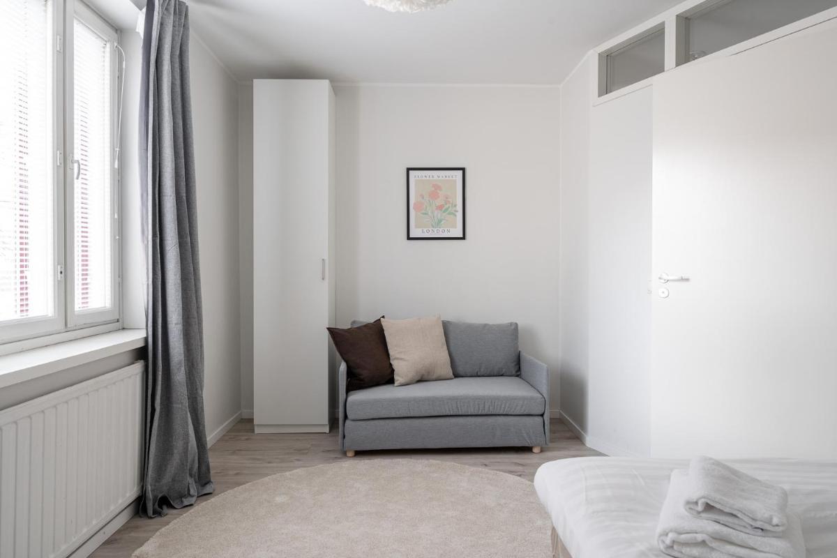Spacious Downtown Apartment with Balcony next to Restaurants - Hosted by 2ndhomes - Housity