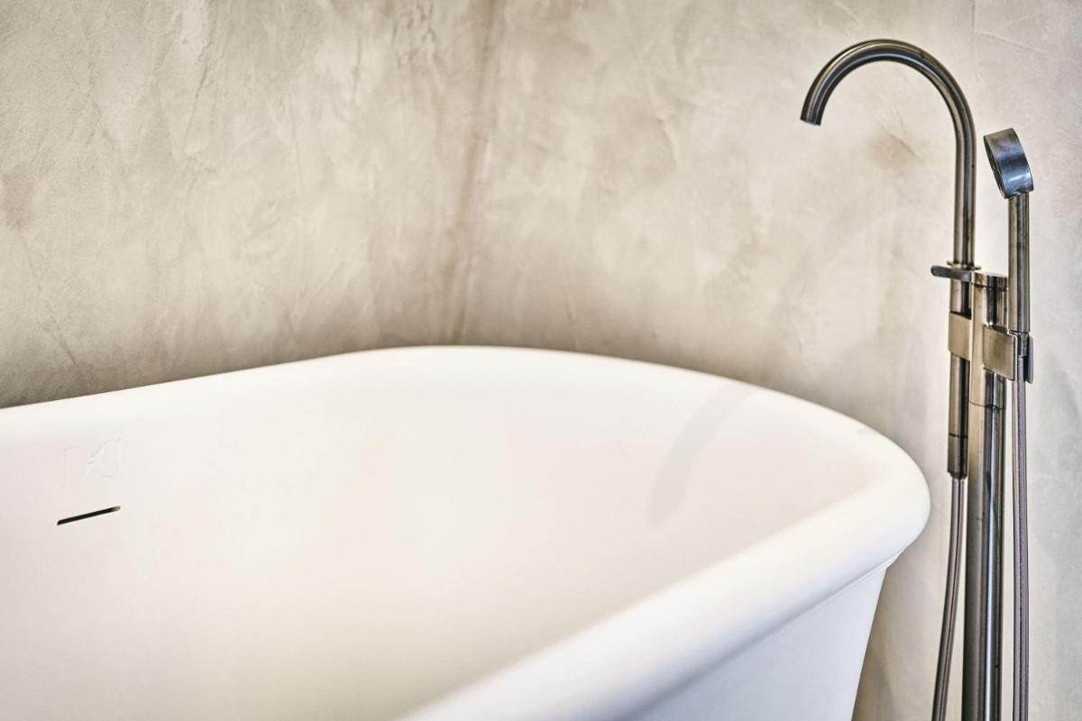 Salle de bains dans l'établissement La Ferme D'Augustin
