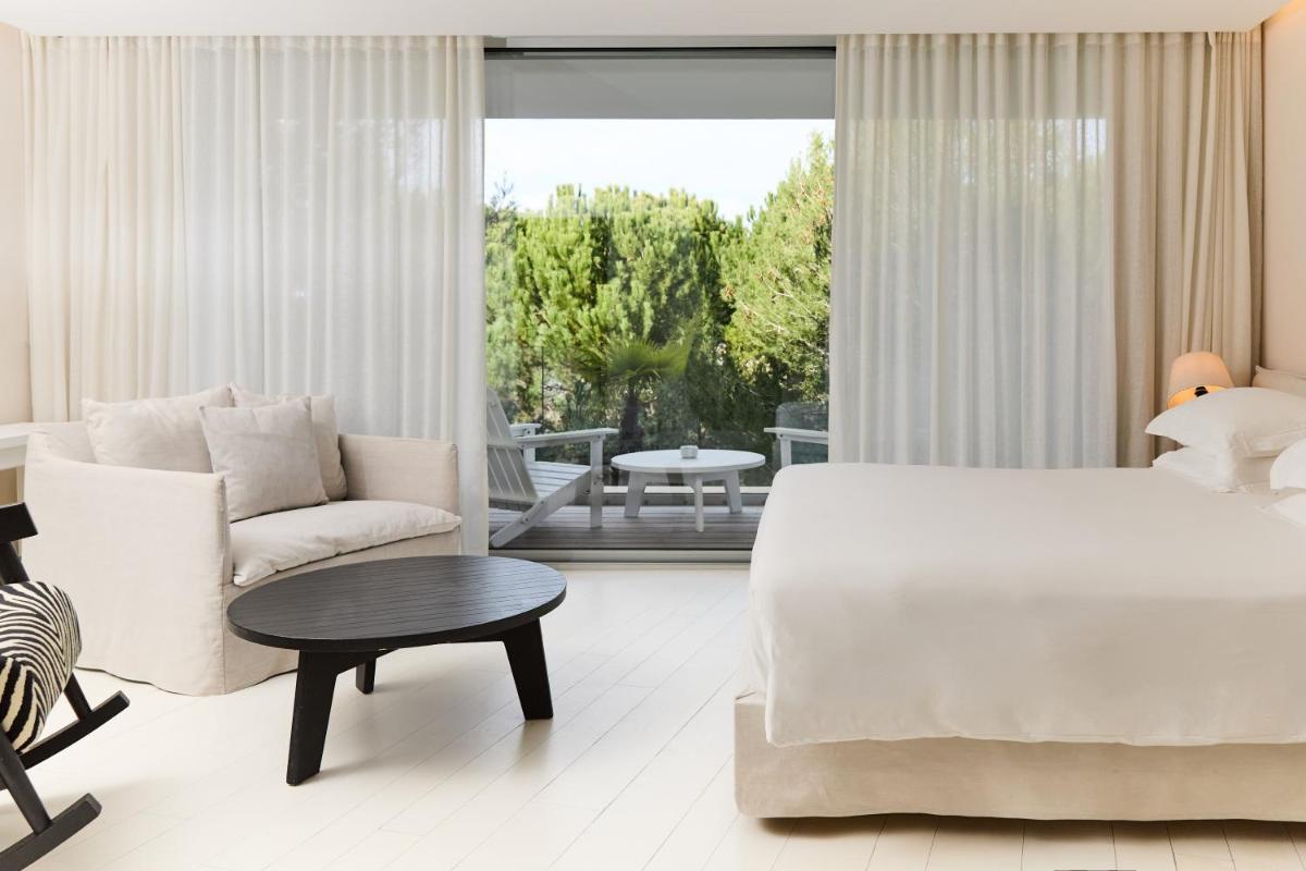 Un ou plusieurs lits dans un hébergement de l'établissement Hôtel Plage Palace & Spa