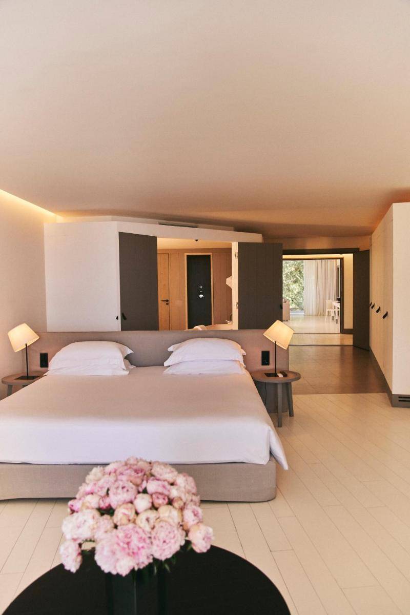 Un ou plusieurs lits dans un hébergement de l'établissement Hôtel Plage Palace & Spa