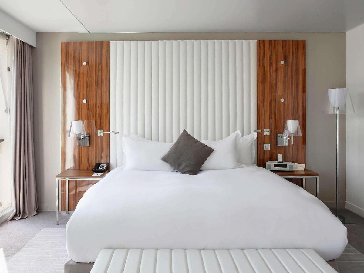 Un ou plusieurs lits dans un hébergement de l'établissement Sofitel Golfe d'Ajaccio Thalassa Sea & Spa