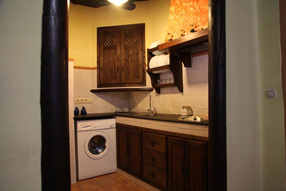 Una cocina o zona de cocina en Turismo Rural & SPA El Cercado