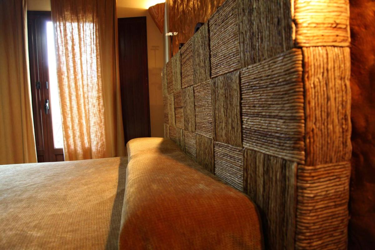 Cama o camas de una habitación en Turismo Rural & SPA El Cercado