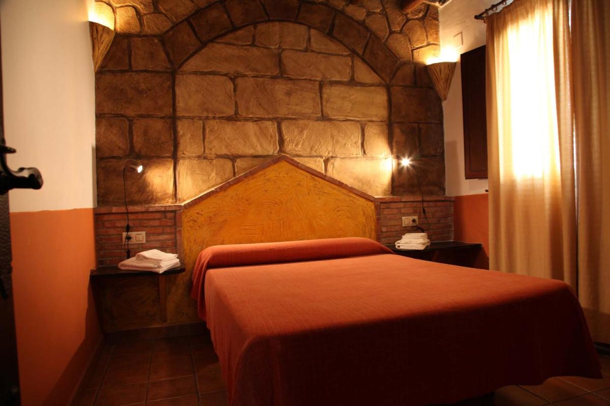 Cama o camas de una habitación en Turismo Rural & SPA El Cercado