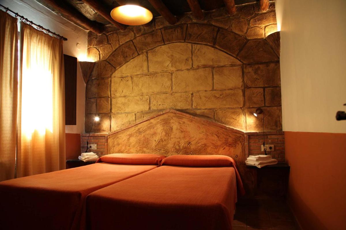 Cama o camas de una habitación en Turismo Rural & SPA El Cercado
