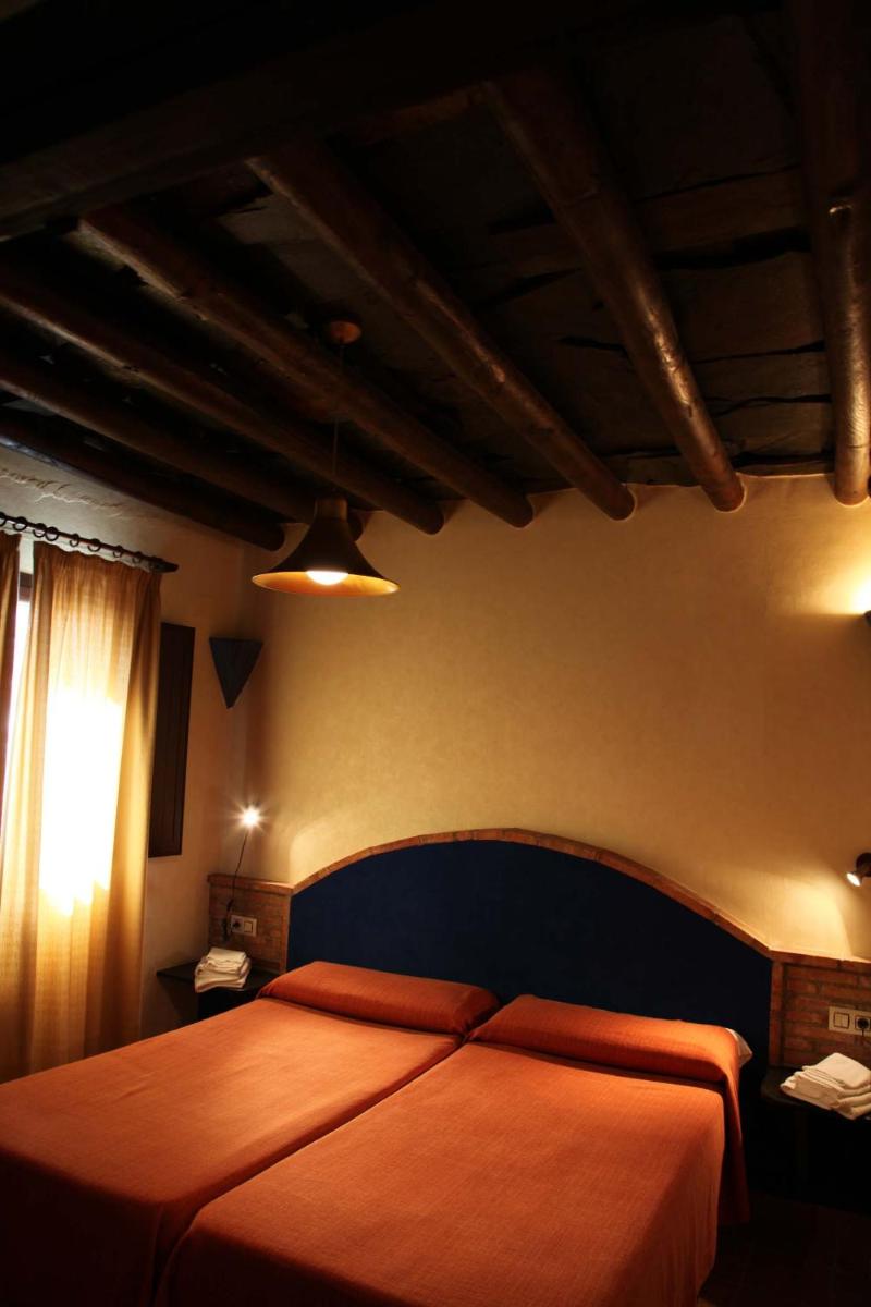 Cama o camas de una habitación en Turismo Rural & SPA El Cercado