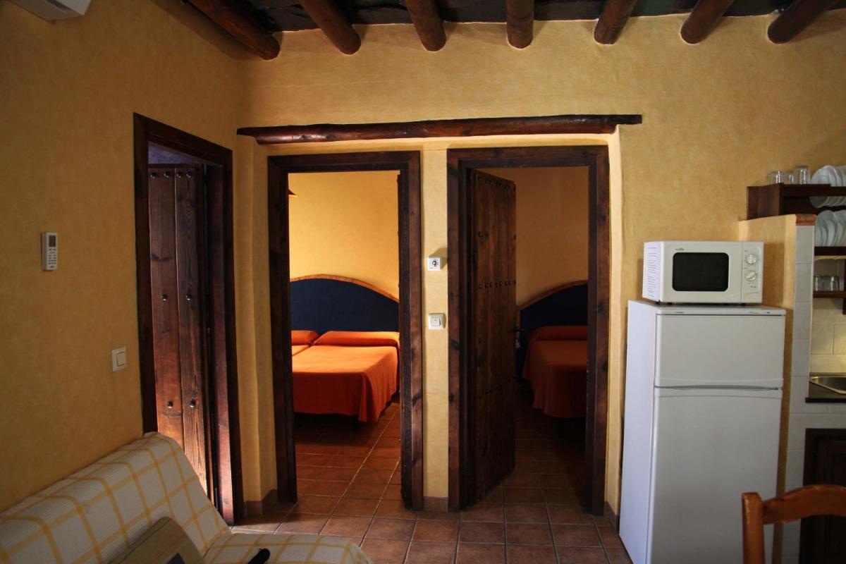 Cama o camas de una habitación en Turismo Rural & SPA El Cercado