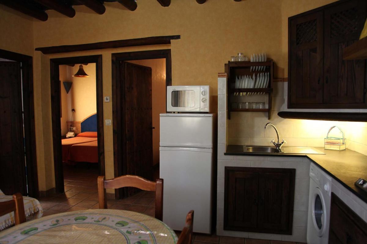 Una cocina o zona de cocina en Turismo Rural & SPA El Cercado