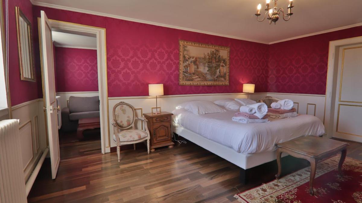 Un ou plusieurs lits dans un hébergement de l'établissement Chateau du boulay morin