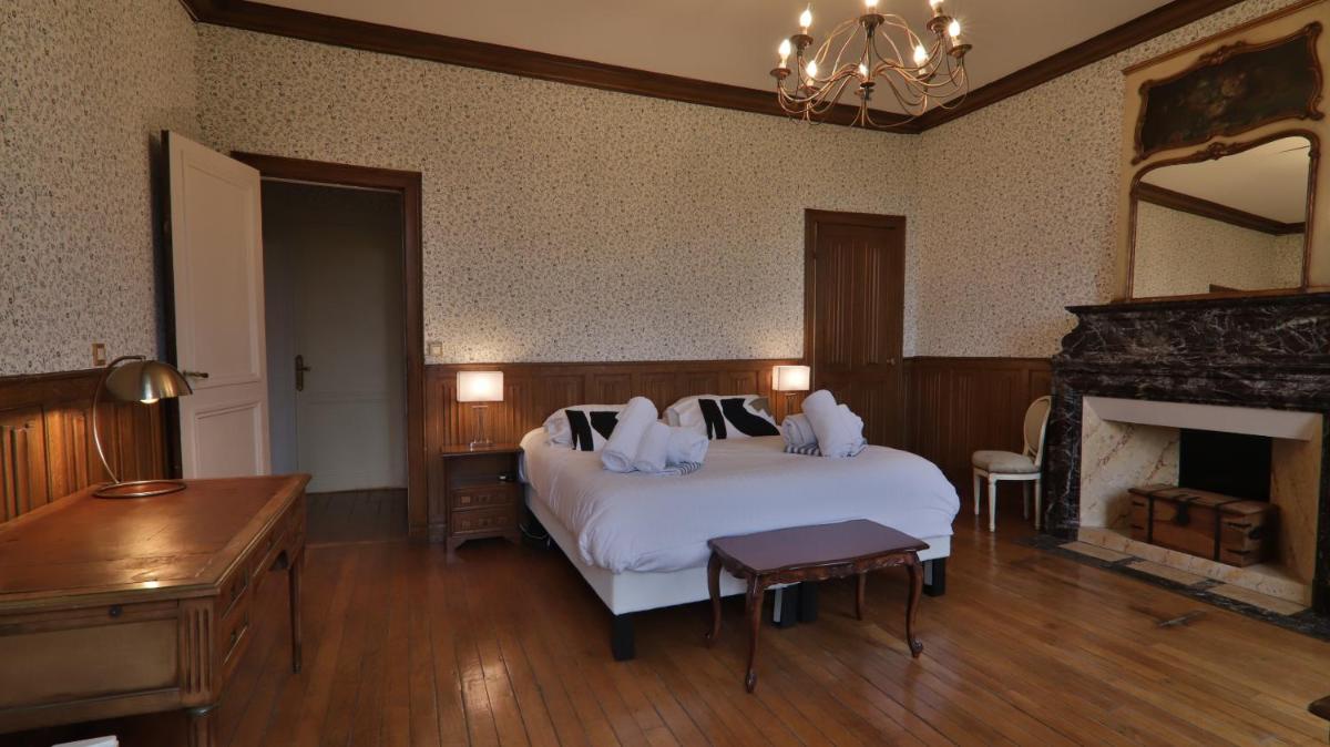 Un ou plusieurs lits dans un hébergement de l'établissement Chateau du boulay morin