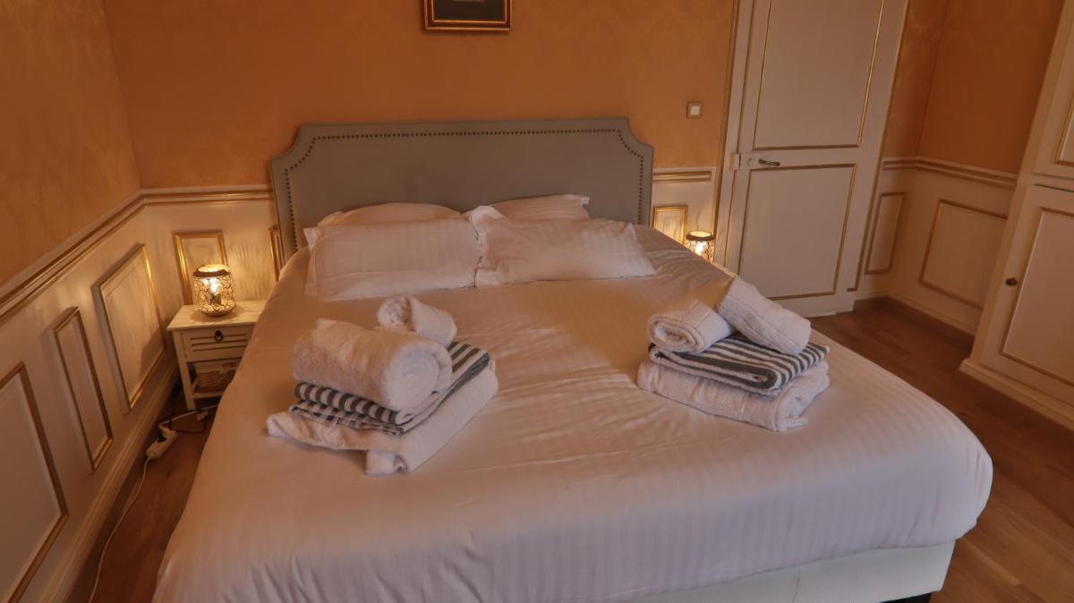 Un ou plusieurs lits dans un hébergement de l'établissement Chateau du boulay morin