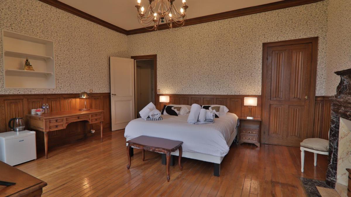 Un ou plusieurs lits dans un hébergement de l'établissement Chateau du boulay morin