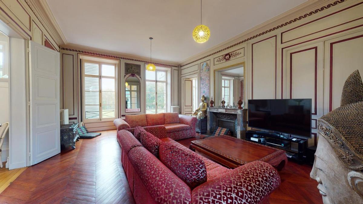 Télévision ou salle de divertissement dans l'établissement Chateau du boulay morin