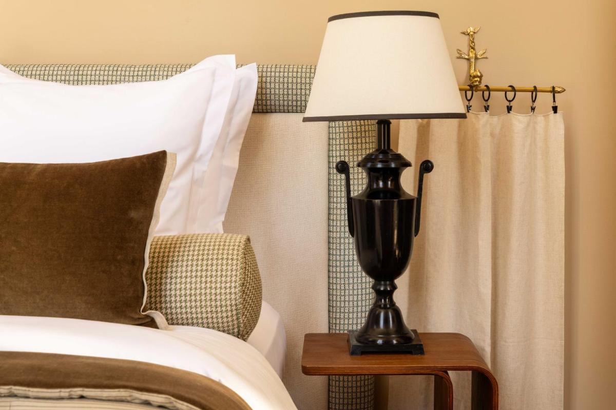 Un ou plusieurs lits dans un hébergement de l'établissement Château d'Augerville Golf & Spa Resort - TemptingPlaces Collection
