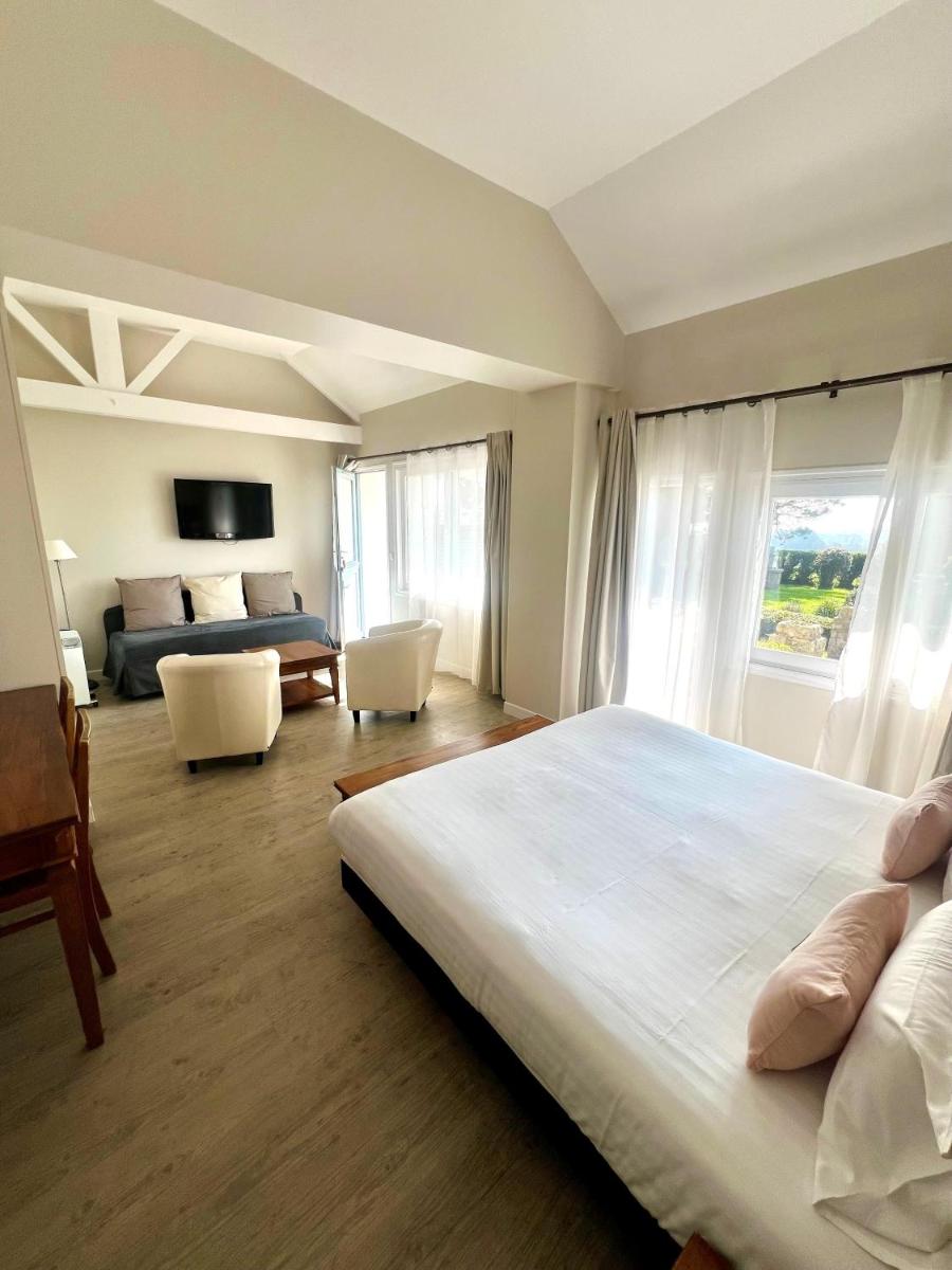 Un ou plusieurs lits dans un hébergement de l'établissement Hotel Restaurant Spa du Tumulus Carnac