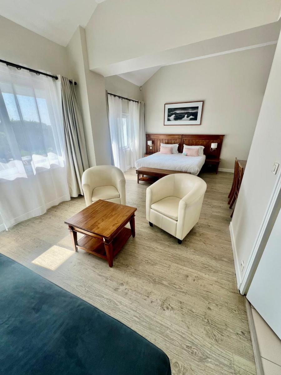 Un ou plusieurs lits dans un hébergement de l'établissement Hotel Restaurant Spa du Tumulus Carnac