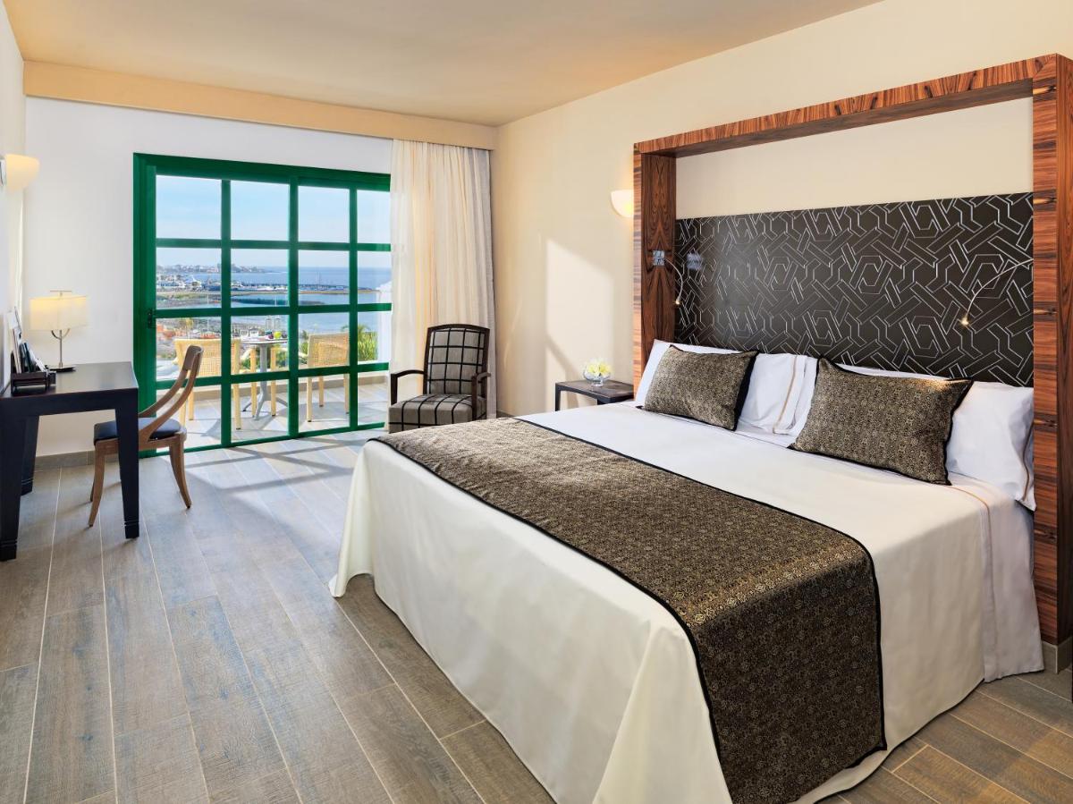 Cama o camas de una habitación en Adrián Hoteles Jardines de Nivaria