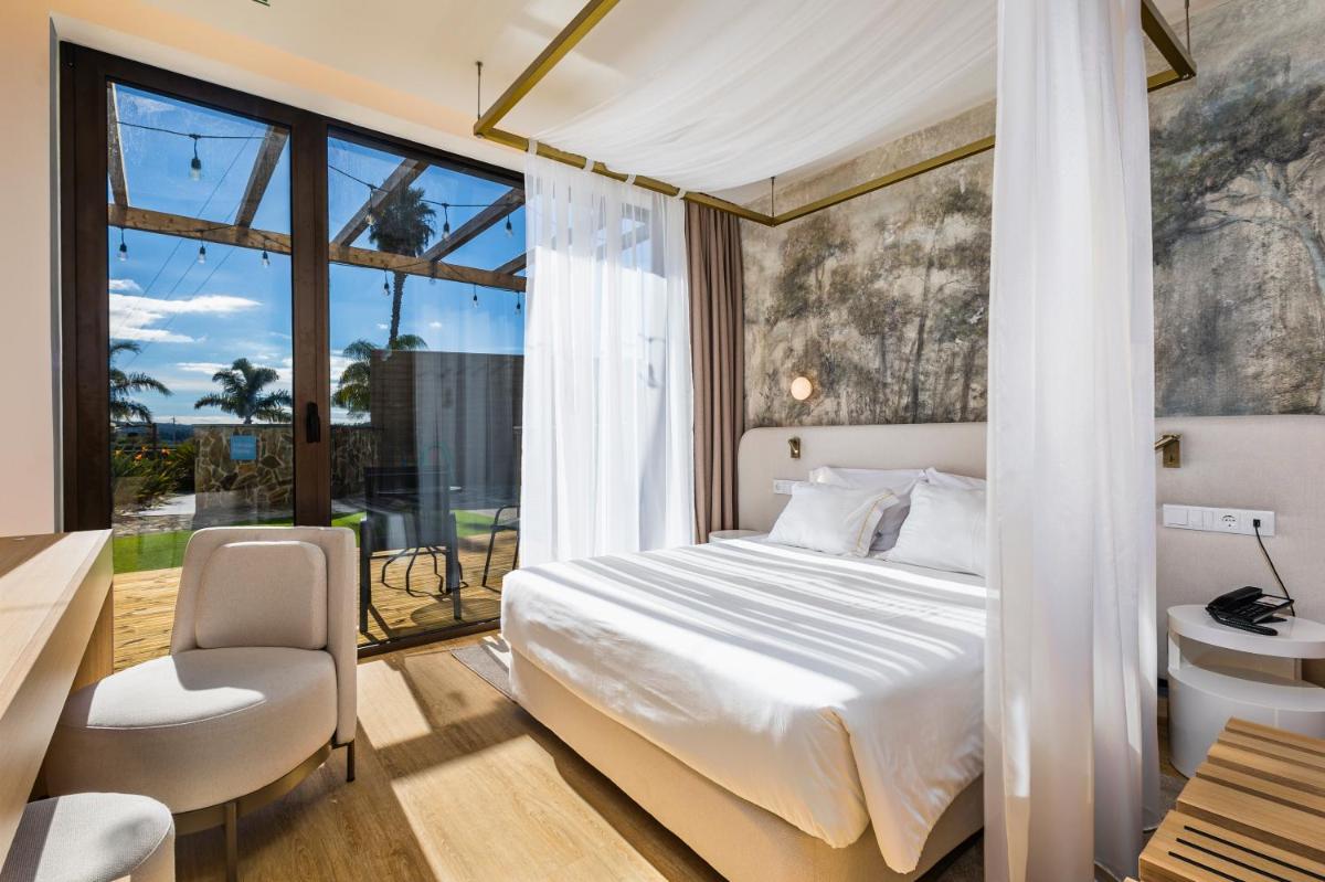 Uma cama ou camas num quarto em Lisotel - Hotel & Spa