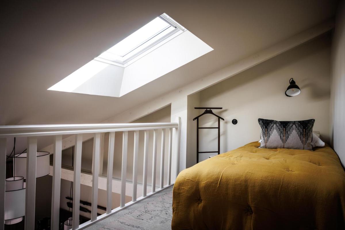 Un ou plusieurs lits dans un hébergement de l'établissement Domaine de Locguénolé & Spa - Relais & Chateaux