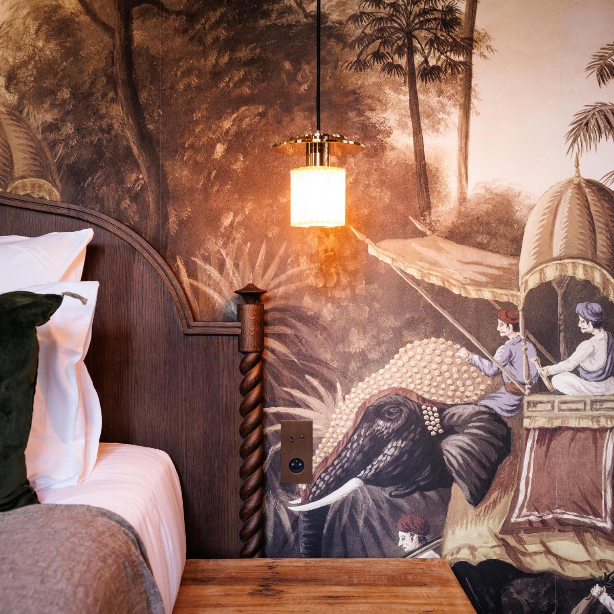 Un ou plusieurs lits dans un hébergement de l'établissement Domaine de Locguénolé & Spa - Relais & Chateaux
