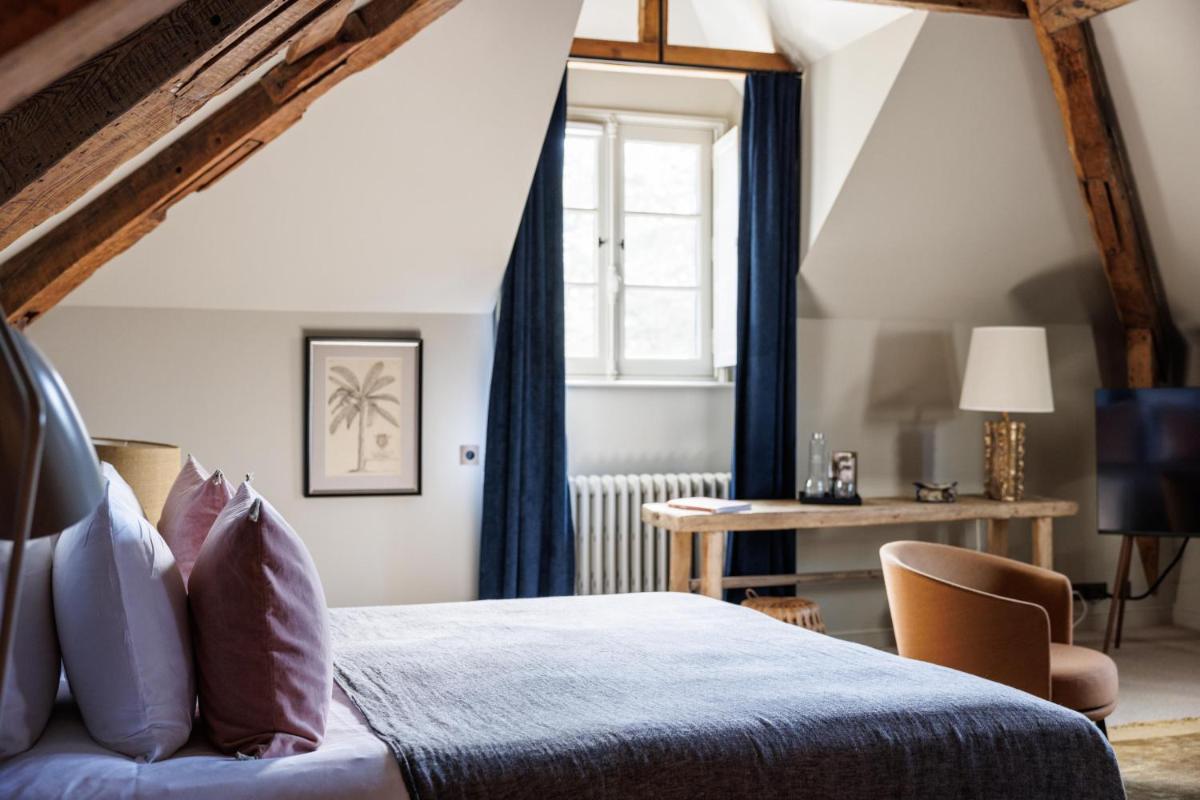 Un ou plusieurs lits dans un hébergement de l'établissement Domaine de Locguénolé & Spa - Relais & Chateaux