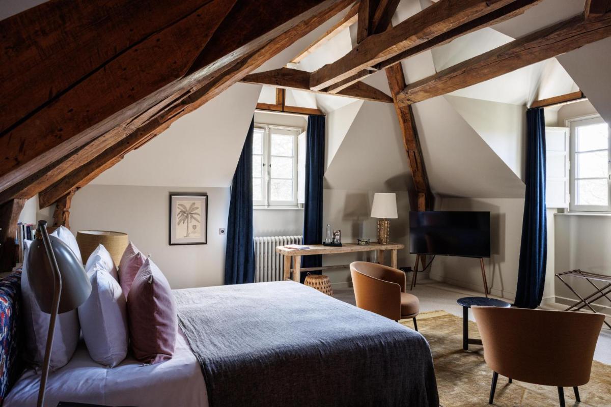 Télévision ou salle de divertissement dans l'établissement Domaine de Locguénolé & Spa - Relais & Chateaux