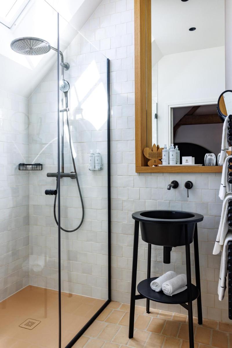 Salle de bains dans l'établissement Domaine de Locguénolé & Spa - Relais & Chateaux