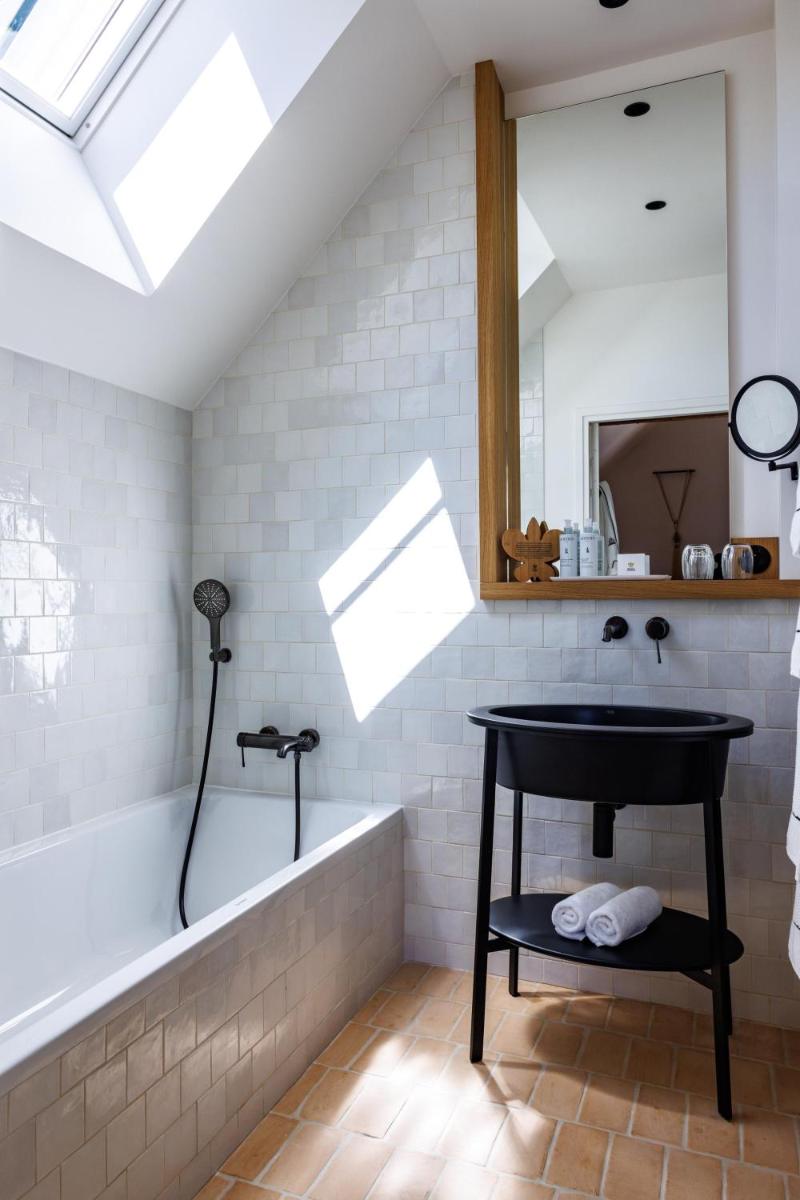 Salle de bains dans l'établissement Domaine de Locguénolé & Spa - Relais & Chateaux