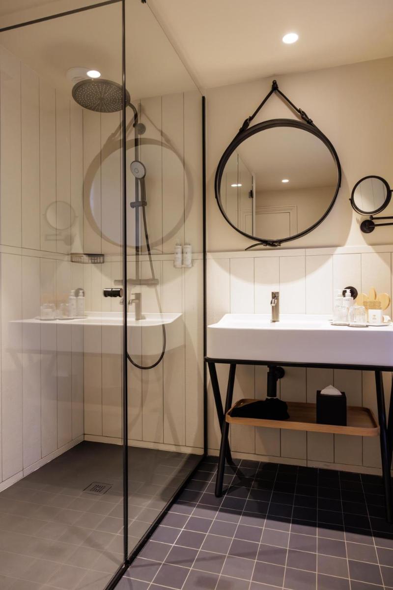 Salle de bains dans l'établissement Domaine de Locguénolé & Spa - Relais & Chateaux