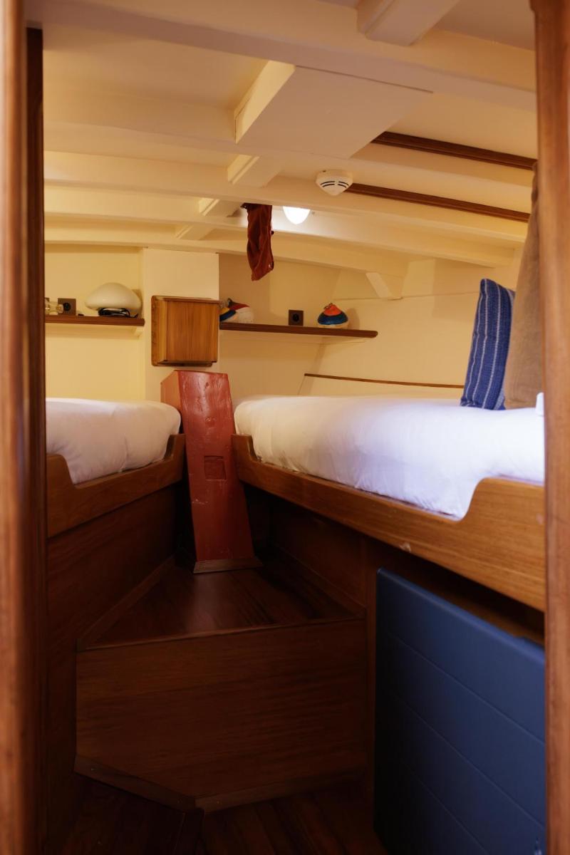 Un ou plusieurs lits dans un hébergement de l'établissement Domaine de Locguénolé & Spa - Relais & Chateaux