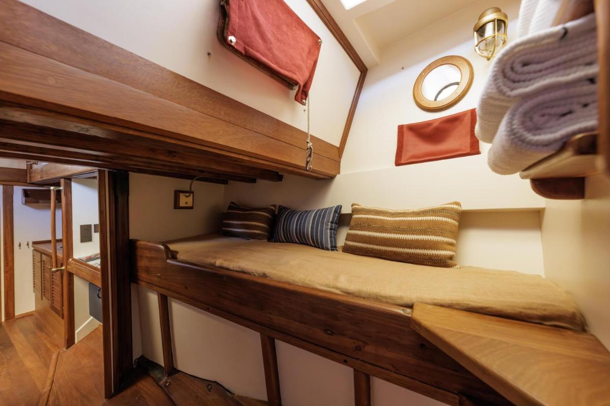 Un ou plusieurs lits dans un hébergement de l'établissement Domaine de Locguénolé & Spa - Relais & Chateaux