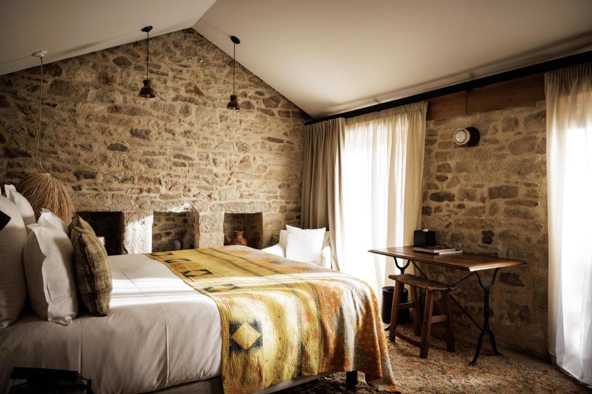 Un ou plusieurs lits dans un hébergement de l'établissement Domaine de Locguénolé & Spa - Relais & Chateaux