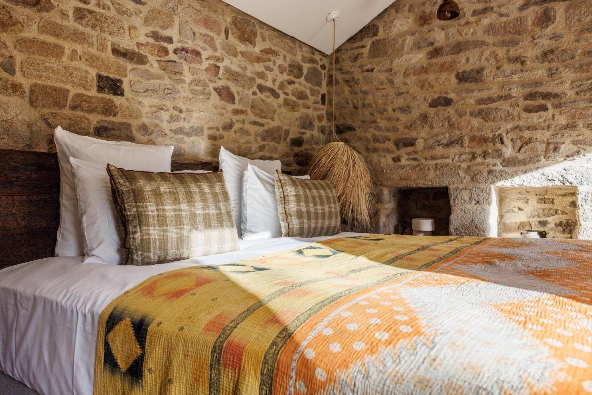 Un ou plusieurs lits dans un hébergement de l'établissement Domaine de Locguénolé & Spa - Relais & Chateaux