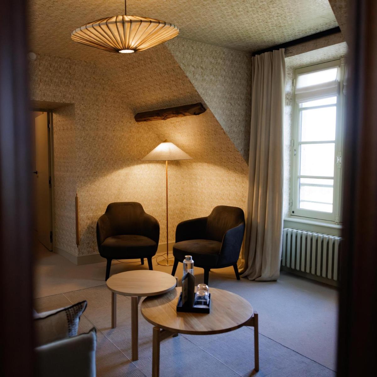 Coin salon dans l'établissement Domaine de Locguénolé & Spa - Relais & Chateaux