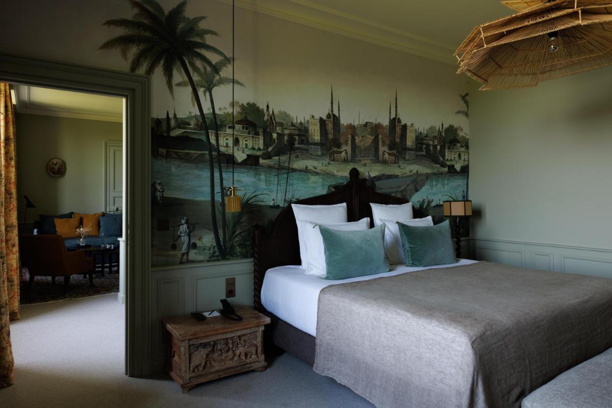 Un ou plusieurs lits dans un hébergement de l'établissement Domaine de Locguénolé & Spa - Relais & Chateaux