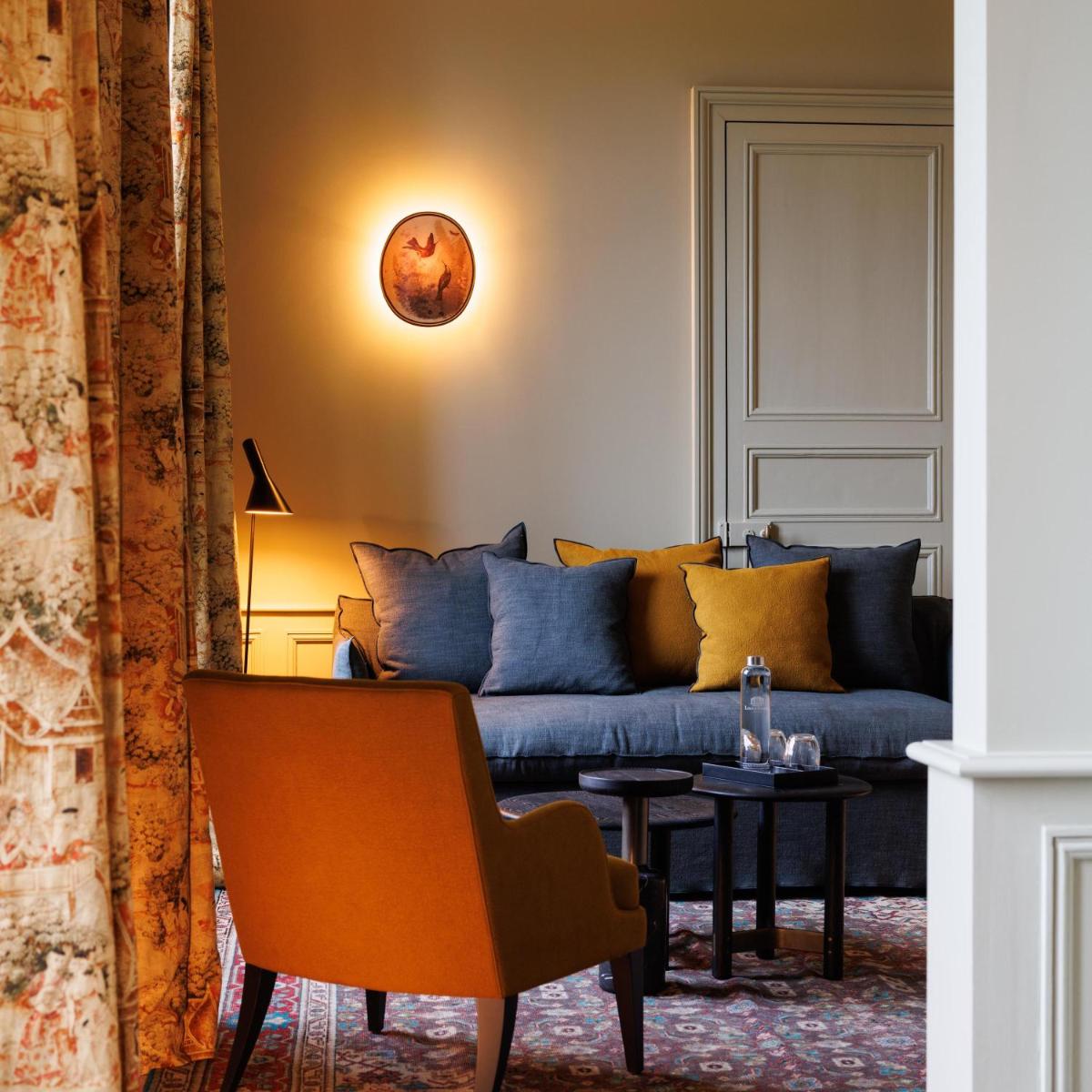 Coin salon dans l'établissement Domaine de Locguénolé & Spa - Relais & Chateaux