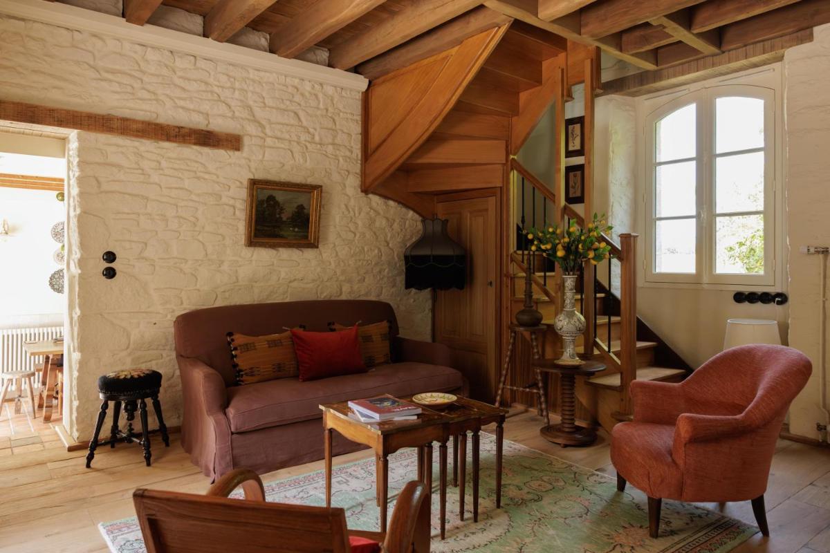 Coin salon dans l'établissement Domaine de Locguénolé & Spa - Relais & Chateaux